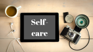 iPad with the word self-care