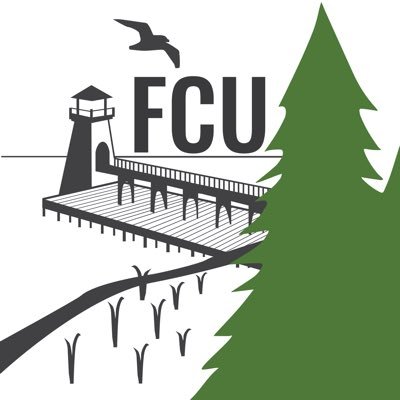 Filer Credit Union's company logo consists of a drawing on a gray lighthouse with a gray wooden dock leading to it, with gray land / grass closets to the viewer. To the right is a large green tree, which is the closest object to the viewer. The background is white. There is the gray, capitalized text "FCU" at the top center of the image with a gray silhouette of a seagull with its wings spanned above the F in FCU.