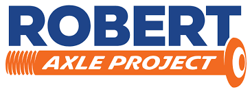 The Robert Axle Project's company logo consists of the text "ROBERT AXLE PROJECT." ROBERT is in all caps, in a navy blue font, and is above the word "AXLE PROJECT." "AXLE PROJECT" is in a white, all-capitalized italicized text. It is inside of an orange axle. The background is white.