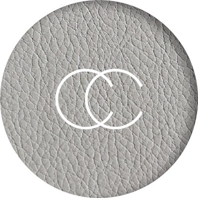 California Closets' logo consists of two capital, white C's that cross over each other (side-by-side) over a grayed-out leather-looking background.