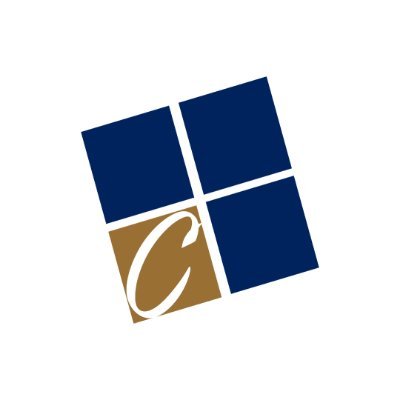 Cornerstone University's school logo consists of 4 individual squares (not connected) that are navy blue (3) and a golden brown (1). The golden brown square has a cursive, italicized, white C inside of it. The background is white.
