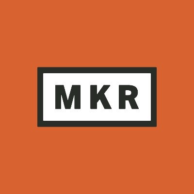 MKR's company logo consists of a pastel orange background with a white, vertical rectangle with a black outline. Inside the rectangle is the black, capitalized, bolded text "MKR."