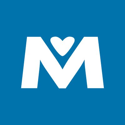 Metropolitan Ministries' company logo consists of a blue background with a white, capitalized M with a white heart in the v-portion of the M.