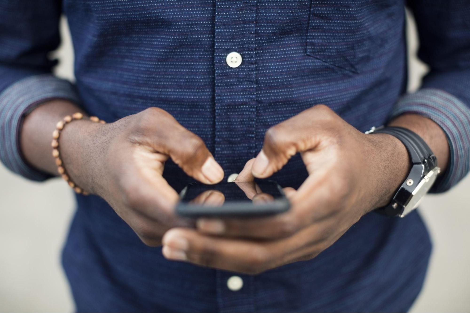 Man holding his smartphone