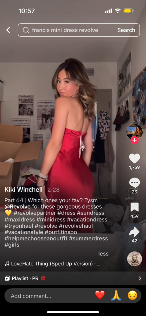 TikTok of woman showing off her red dress from Revolve. She thanks them in the description.