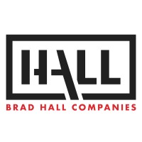 Brad Hall Companies' company logo consists of a black outline of a rectangle with the black text "HALL" inside of it. Underneath reads the red text "BRAD HALL COMPANIES."