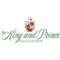 The King and Prince Beach & Golf Resort's company logo consists of a knight's helmet on top of an ornate shield, with the cursive green text "The King and Prince Beach & Golf Resort" below it.